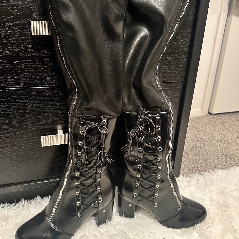 Knee high zip boots
